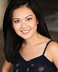 Doan Phuong Nguyen author photo. Doan Phuong has straight black hair and is wearing a black tank top.