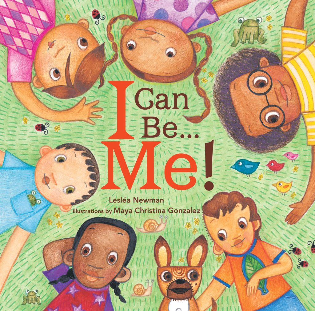 Cover of I Can Be...Me!, showing a group of diverse children laying on the grass in a circle with their heads nearly touching.